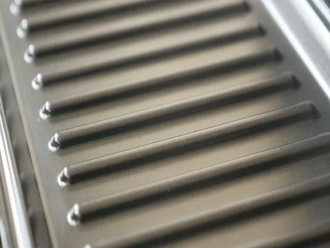 Close-up of modern pie iron shaping surface Stock Footage 85066891