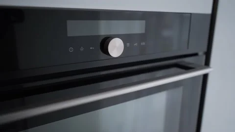 Close-up of modern plate panel. Cooking concept. Kitchen stove handle with Stock Footage 160486222