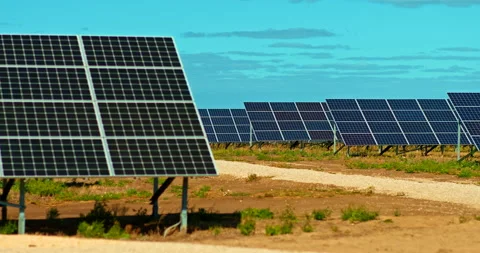 Close-up, modern solar panels stand in rows, a huge solar power plant Stock Footage 139116843