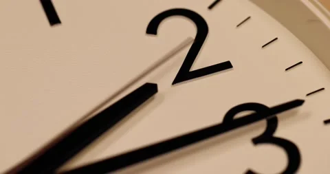 Close up of modern Wall clock showing running time pointer, with Background O Stock Footage 167723989
