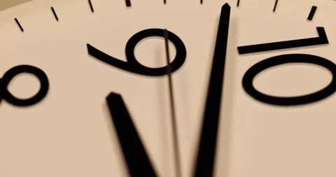 Close up of modern Wall clock showing running time pointer, with Background O Stock Footage 167723993