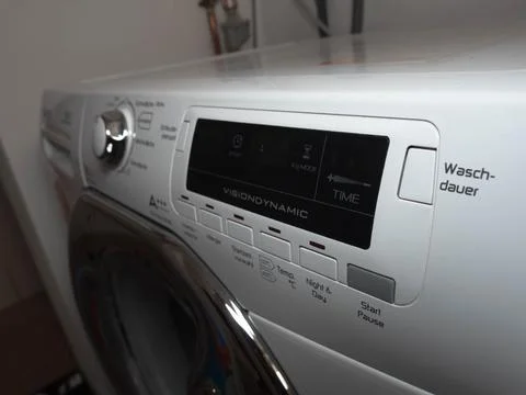 Close-up of a Modern White Washing Machine Control Panel with Digital Display Stock Photos