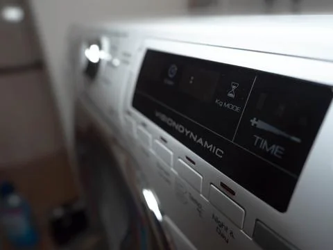 Close-up of a Modern White Washing Machine Control Panel with Digital Display Stock Photos