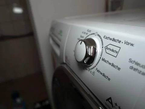 Close-up of a Modern White Washing Machine Control Panel with Digital Display Stock Photos