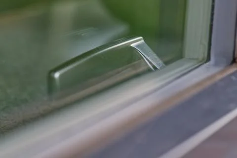Close up of a Modern Window Handle Stock Photos