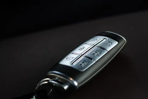 Close up of a modern wireless car key. Modern car interior. Foto stock
