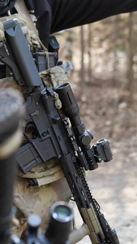 Close up of modernized assault rifle with professional optical scope Stock Footage 333612677