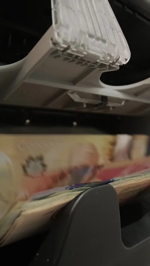 Close-up of money counter machine processing 100 US dollar bills. Banking concep Stock Footage 331504301