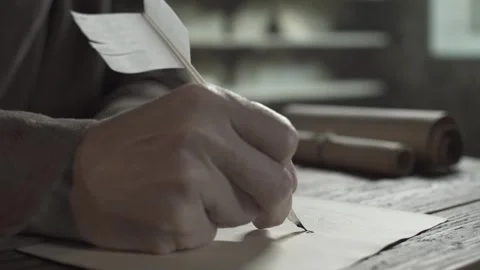 Close up of monk hand writing the first calligraphy letter with a quill pen Stock Footage 339232013