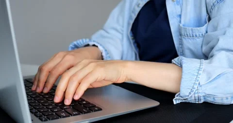Close up montage of a programmers hands rapidly typing code on a laptop keyboard Stock Footage 316756486
