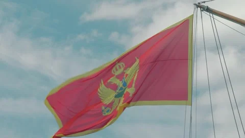Close up of Montenegrin Flag Waving in the Wind Stock Footage 277486784