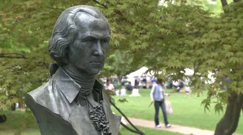 Close up of a monument with a craft fair in background (1 of 2) Stock Footage 10775235