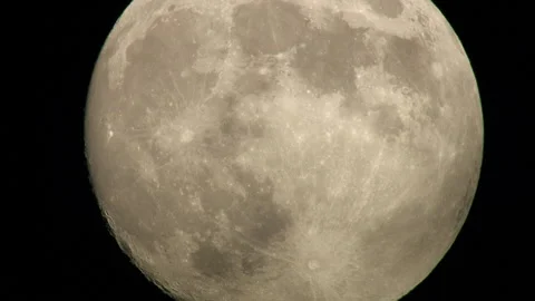Close up of moon as clouds pass over NYC Stock Footage 135948888