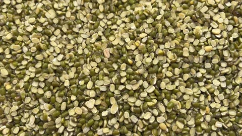 Close-Up of Moong Dal Grains | Split Green Gram Lentils Macro Texture Natural 스톡 동영상 318729039