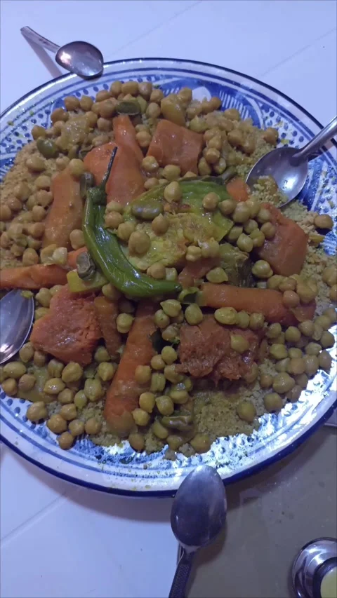 Close-up of Moroccan Vegetable Couscous in Traditional Pottery Stock Footage 334953339