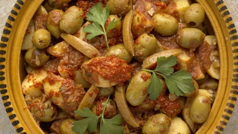 Close-up of Moroccan vegetable potato tagine in a traditional tagine clay pot. Stock Footage 342347799