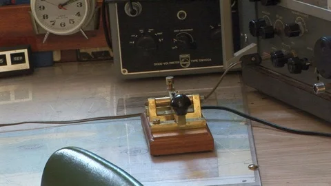 Close up of a Morse code instrument on-board a deep sea tug. Stock Footage 104224100