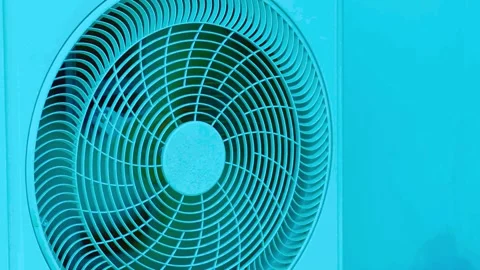 Close up motion of an air conditioner fan cooling outdoor unit Stock-Footage 342905445