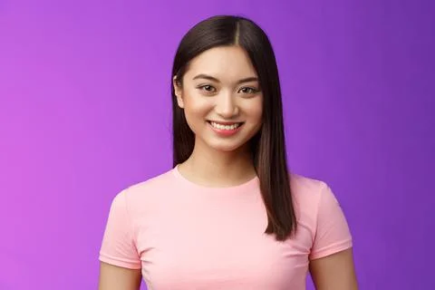 Close-up motivated assertive good-looking asian woman smiling toothy white Stock Photos