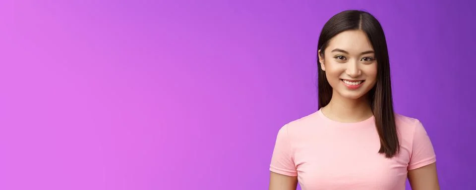 Close-up motivated assertive good-looking asian woman smiling toothy white Stock Photos