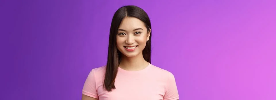 Close-up motivated assertive good-looking asian woman smiling toothy white Stock Photos