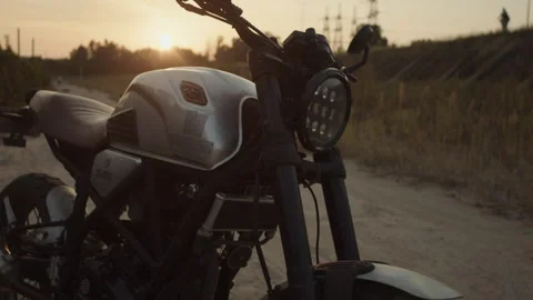 A close-up on a motorcycle in a background sunlight Video stock 253448380