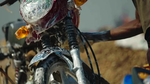 Close-up of motorcycle being washed Stock Footage 338167520