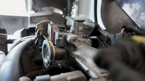 Close-up of Motorcycle Engine Throttle Body and Fuel Injection System Stock Footage 329456900