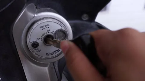 Close up of a motorcycle key Stock Footage 274624107