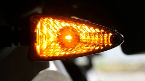 Close up of motorcycle turn signal Stock Footage 124472969