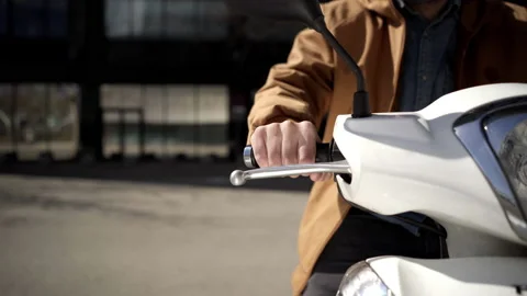 Close-up of the motorcyclist's hand. The concept of speed, movement, forward  Stock Footage 153251385