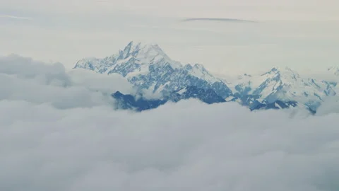 Close up of Mount Cook above the rolling clouds Stock Footage 154990999