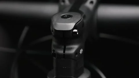 Close up on mountain bike handlebar on black background. Video stock 166244331