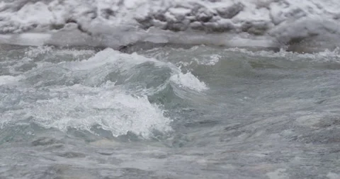 Close up of a mountain river stream with clear water at winter Stock Footage 150489248