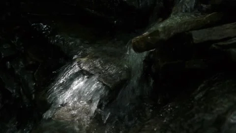 Close up of mountain stream water breaking against rocks Stock-Footage 162052310