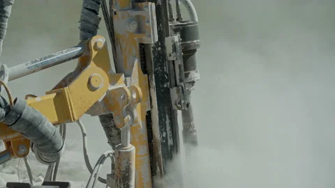 Close-up, In a mountainous area, a drilling rig makes a hole in the rock Vídeos de archivo 153801706