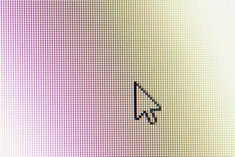 Close up of mouse cursor on computer screen Stock Photos