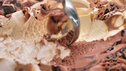 Close up Move the camera, Vanilla ice cream scooped out from container with a Stock Footage 238371100