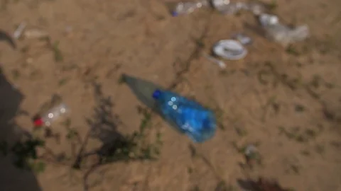 Close-up. The movement of the camera at hand, which collects plastic waste in a Video stock 117808840