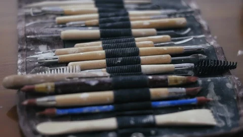 Close-up, Movement, Potter's Tools Lie on the Table Stock Footage 123004903