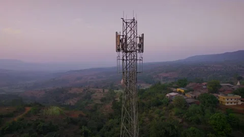 A close movement shot of the cellular mobile tower in the evening Stock Footage 282444395