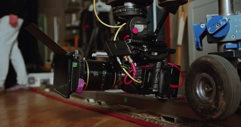 Close-up of a movie camera on Dolly's cart. The video production industry. Stock Footage 220849258