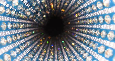 Close up moving abstract background with blue silk, false diamonds and crystals Stock Footage 154016830