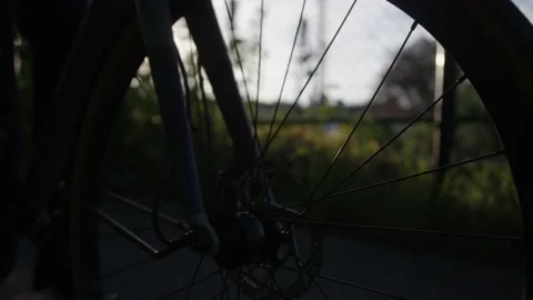 Close up of a moving bicycle wheel Stock Footage 132709133