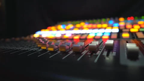 Close up of moving buttons on dj remote or soundboard. Recording studio Stock Footage 322162984