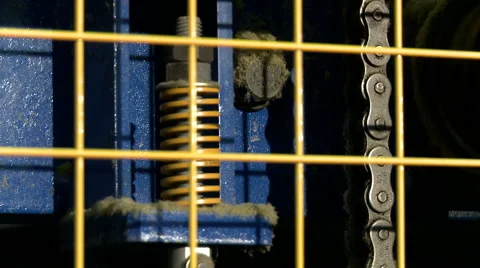 Close-up of moving chain on production machine Stock Footage 56537468