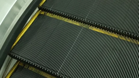 Close Up of Moving Escalator Steps at Modern Transit Terminal Stock Footage 342249913
