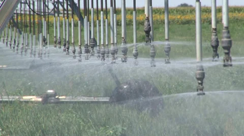 Close up of moving irrigation sprinklers Stock Footage 39818652