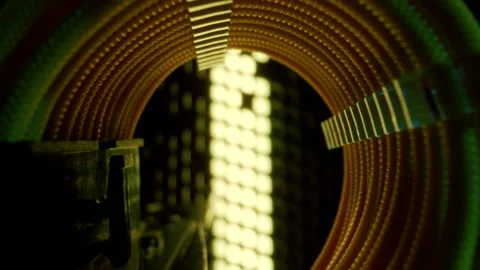 Close-up moving macro shot of the coil of yellow cable in gaming computer Stock Footage 202652344