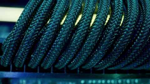 Close-up moving macro shot of the coil of black cable in gaming computer. Stock Footage 205044602